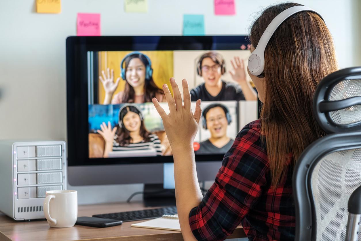 Team on a Computer Screen Waving